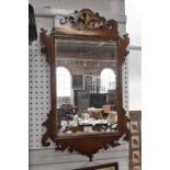 A GEORGE III STYLE MAHOGANY FRAMED WALL MIRROR 29" high x 18" wide