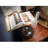 A 1920S OAK-CASED BAROMETER, 'Braybrooke Dorchester', a glass decanter and 'The Dictionary of Garden