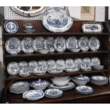 A LARGE QUANTITY OF BLUE AND WHITE DINNERWARE, mainly Johnson Bros coaching scenes