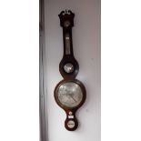 A REGENCY MAHOGANY WHEEL BAROMETER , signed 'Chas. Knight'