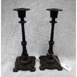 A PAIR OF 19TH CENTURY CAST 'BERLIN' IRON CANDLESTICKS, marked 'Zimmerman' to the base, 8.75" high