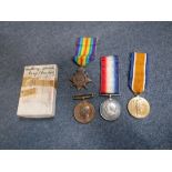 A FIRST WORLD WAR TRIO OF MEDALS, named to '1340 Pte. M.J. Cocklin. 19-Lond. R.' and a George VI