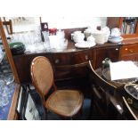 A REPRODUCTION MAHOGANY SIDEBOARD, a similar twin pedestal dining table, a bedroom chair, two