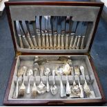 A CANTEEN OF SILVER PLATED CUTLERY in a wooden case