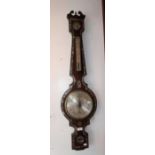 A REGENCY ROSEWOOD WHEEL BAROMETER with mother-of-pearl inlay decoration and signed 'D. Luvate,