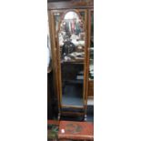 A WALNUT CHEVAL MIRROR and three dressing mirrors