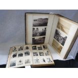 TWO ALBUMS OF EARLY 20TH CENTURY AND LATER PHOTOGRAPHS including military city scenes, interior