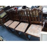 A SET OF FOUR LATE VICTORIAN OAK DINING CHAIRS
