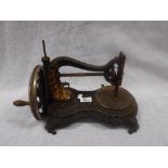 A LATE 19TH CENTURY JONES & CO OF MANCHESTER SEWING MACHINE with fiddle shaped base