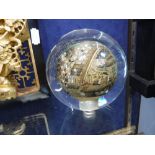 A GLASS SPHERE internally decorated with Oriental scenes