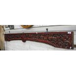 A CARVED CHINESE CANOPY FRONT, with pierced decoration, decorated with vases of flowers and