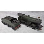 AN 'O' GAUGE CLOCKWORK G.W.R. LOCOMOTIVE (no 2260) AND TENDER (no 2260) with key