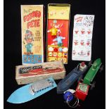 A VINTAGE 'POTATO PETE' (boxed), A Pearce toy speed boat (boxed) and similar era Vintage toys