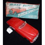 LOUIS MARX & CO; A 1950S 'MARX SUPER MECHANICAL PLASTIC SPORTSTER' with original box Note: Box