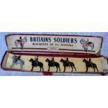 BRITAINS SOLDIERS; REGIMENTS OF ALL NATIONS', a set of five soldiers in green uniform on