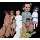 A COLLECTION OF VINTAGE DOLLS, to include a ceramic headed doll, stamped A.M., a celluloid headed