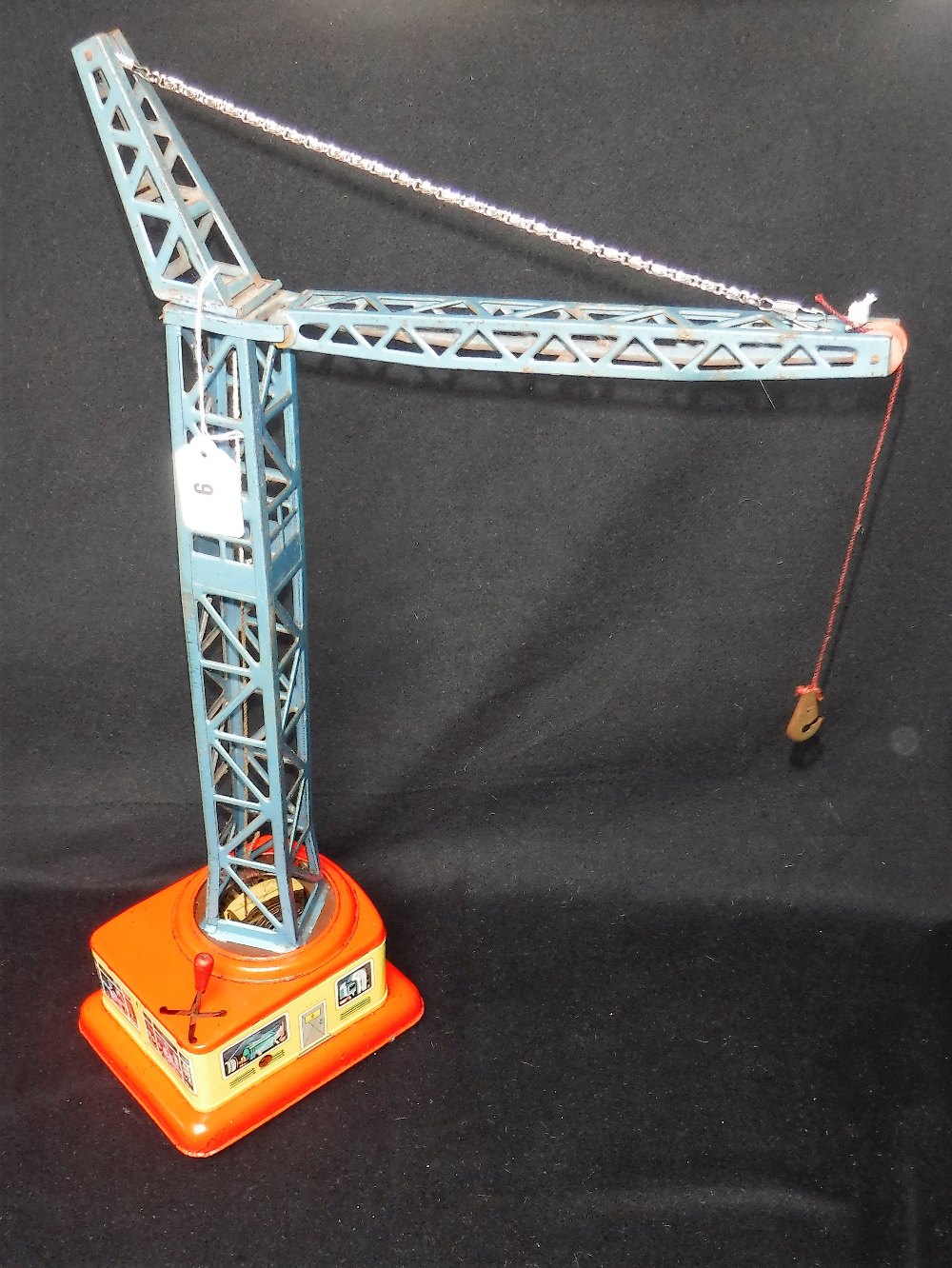 D.B.G.M. A VINTAGE TIN PLATE CLOCKWORK CRANE 23" high