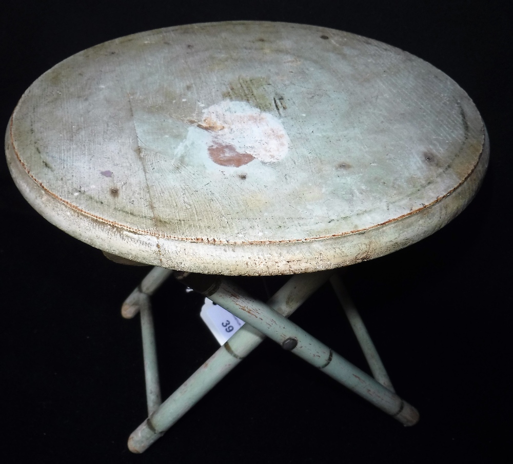 AN EDWARDIAN DOLL'S FOLDING TABLE, with original green and gilt paint work 8" high and a matching - Image 2 of 4