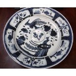 AN ORIENTAL CHARGER, hand-painted in blue with 'V O C' and stylised birds, 16" dia