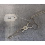 A PAIR OF GEORGE III SCISSOR ACTION SUGAR TONGS, with initials 'IB'