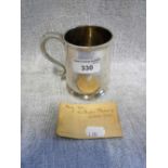 A SILVER CHRISTENING MUG, hallmarked for London, 1726 with scrolling handle