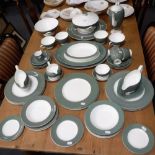 A WEDGWOOD BONE CHINA PART COFFEE AND DINNER SERVICE on white and green ground