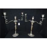 A PAIR OF SILVER PLATED CANDELABRA