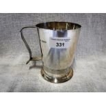 AN ART DECO SILVER MUG with reeded handle