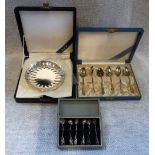 A CHINESE SILVER BOWL in presentation case and similar teaspoons