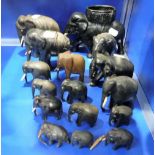 A COLLECTION OF EBONY ELEPHANTS and others similar