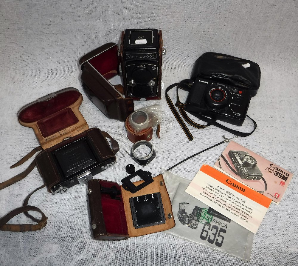 A BOXED YASHICA 635 CAMERA and a collection of other cameras and accessories