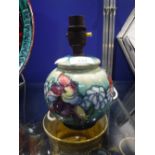 A MOORCROFT TABLE LAMP with floral decoration, 5.5" high (plus fitting)