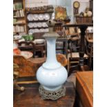 A LATE 19TH CENTURY BLUE OPAQUE GLASS TABLE LAMP with brass fittings