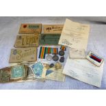 A COLLECTION OF FIRST WORLD WAR MEDALS, with ribbons, and some related paperwork, a collection of