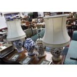 FOUR ITALIAN OVOID SHAPED CERAMIC TABLE LAMPS with polychrome decoration