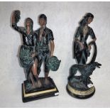 A PAIR OF FRENCH RESIN ART DECO STYLE FIGURES on turned marbled effect stands