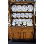 A REPRODUCTION OAK DRESSER WITH LINEN-FOLD PANELS, 42" wide