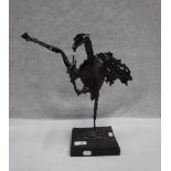 A STEEL STYLISED STUDY OF A GROTESQUE BIRD, 14" high (including wooden plinth)