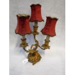 A REGENCY STYLE BRASS THREE BRANCH LAMP BASE with entwined vines