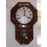 AN OCTAGONAL CASED SETH THOMAS DROP-DIAL WALL CLOCK the cream painted dial with Roman numerals