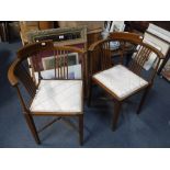 A PAIR OF EDWARDIAN MAHOGANY CORNER CHAIRS with pin-cushion seats