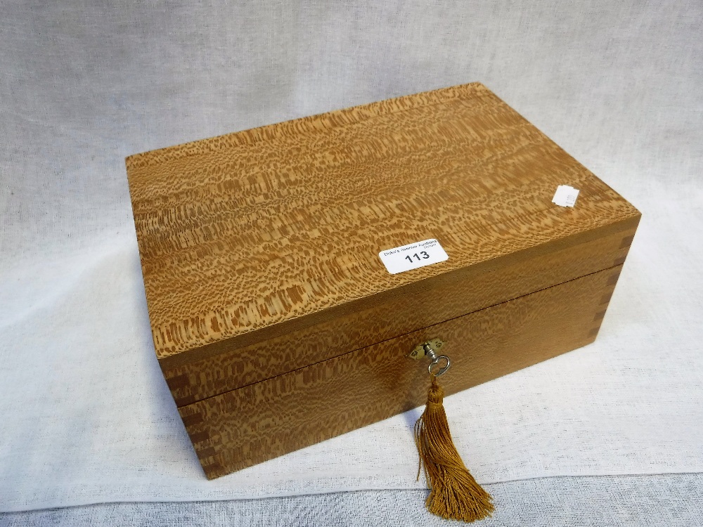 A 'BOOK MATCHED LACEWOOD' JEWELLERY BOX with cedar-lined interior by Andrew Poder
