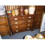 A GEORGE III MAHOGANY CHEST OF DRAWERS with shield shaped escutcheons, 35" wide