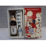 A JAPANESE 'SAKURA-MASAMUNE' BOTTLE OF SAKE with server and four cups (boxed)