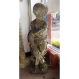 A RECONSTITUTED STONE GARDEN STATUE OF A YOUNG BOY 32" high