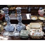 A PAIR OF DELFT BLUE AND WHITE CANDLESTICKS, green Wedgwood jasperware lidded box and dish and other