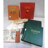 A COLLECTION OF VINTAGE STAMP ALBUMS and loose stamps