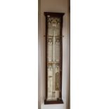A REPRODUCTION 'ADMIRAL FITZROY'S BAROMETER' in a mahogany case 38" high