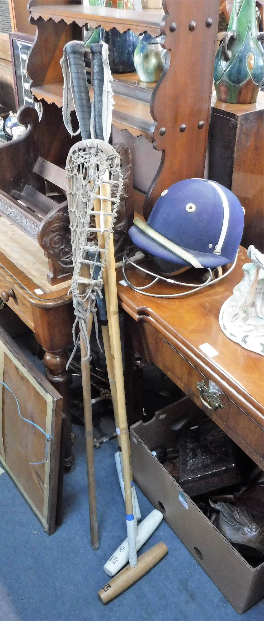 THREE VINTAGE POLO MALLETS, a lacrosse stick and a blue Polo helmet