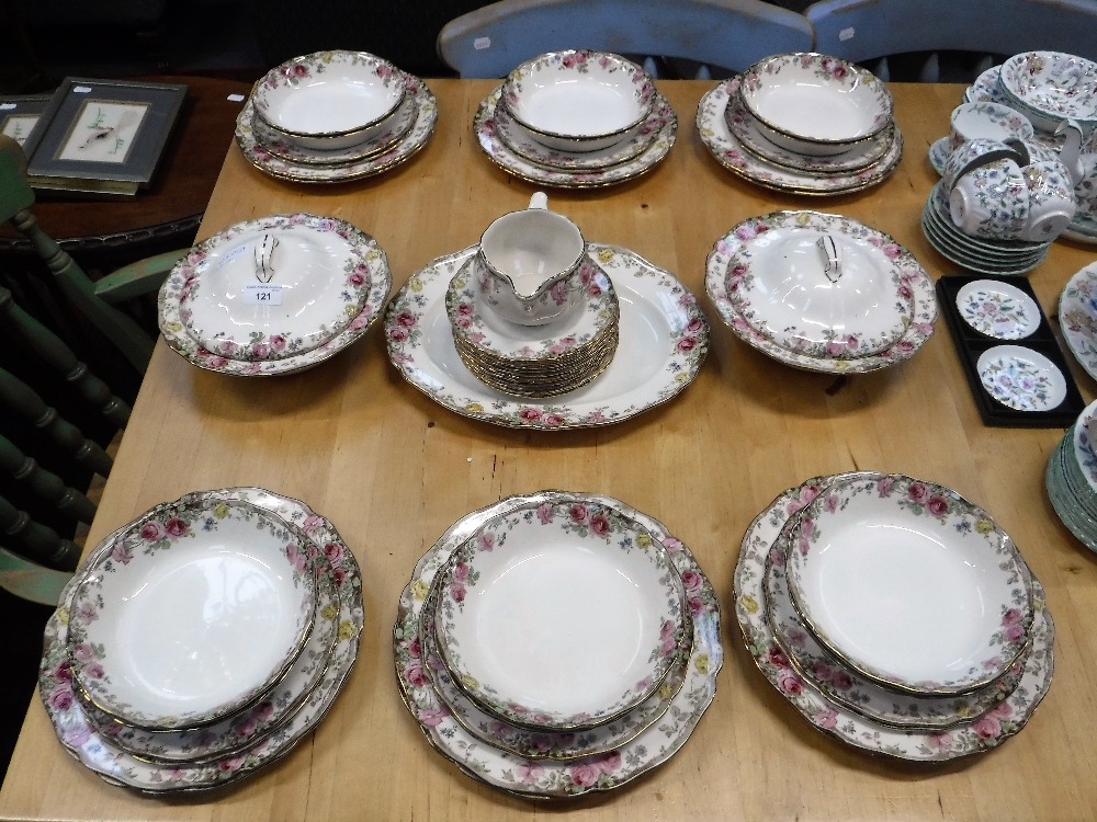 A ROYAL DOULTON TRANSFER DECORATED DINNER SERVICE decorated in the 'English Rose' pattern